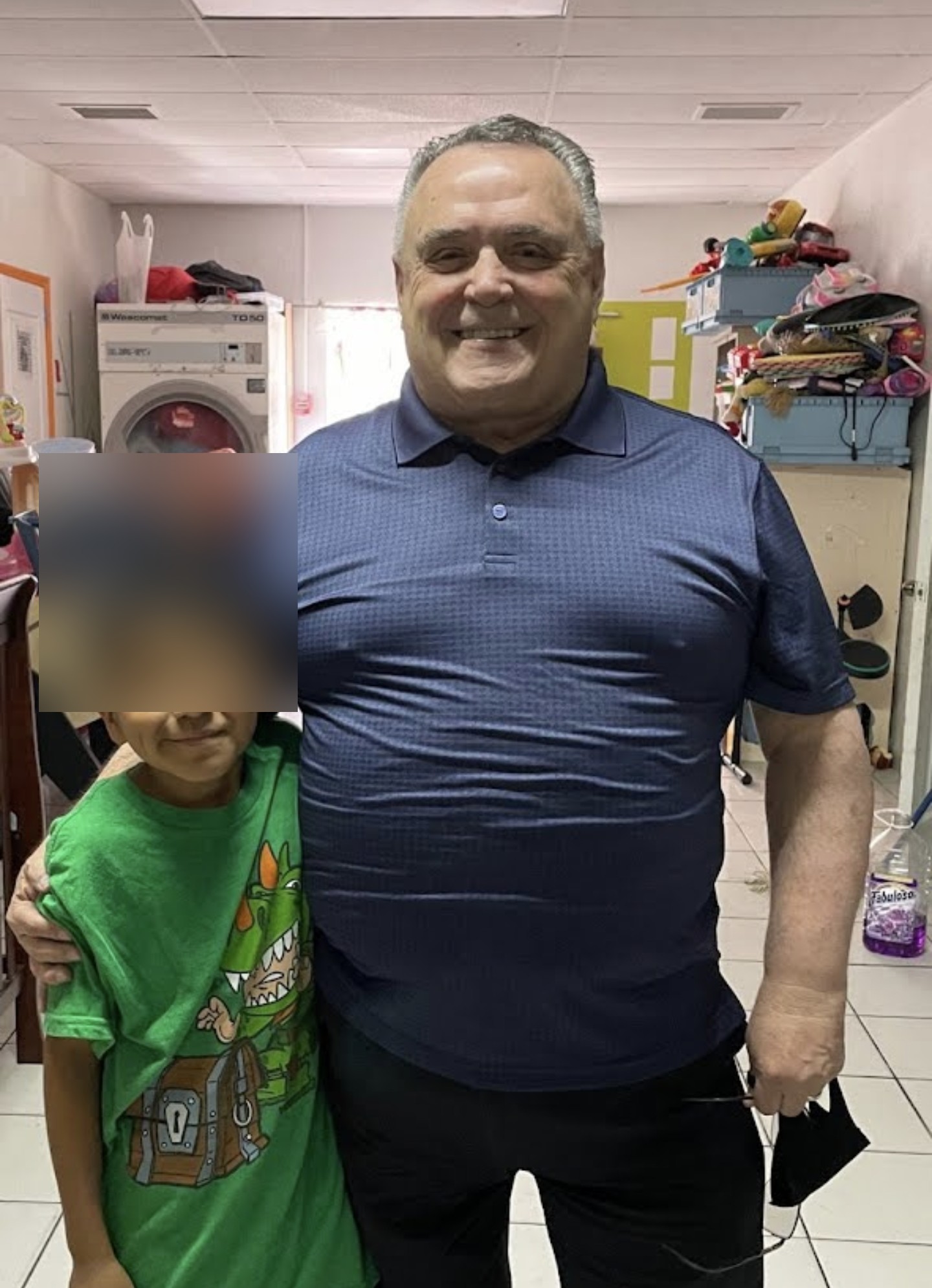 Ministry member with a child at the orphanage